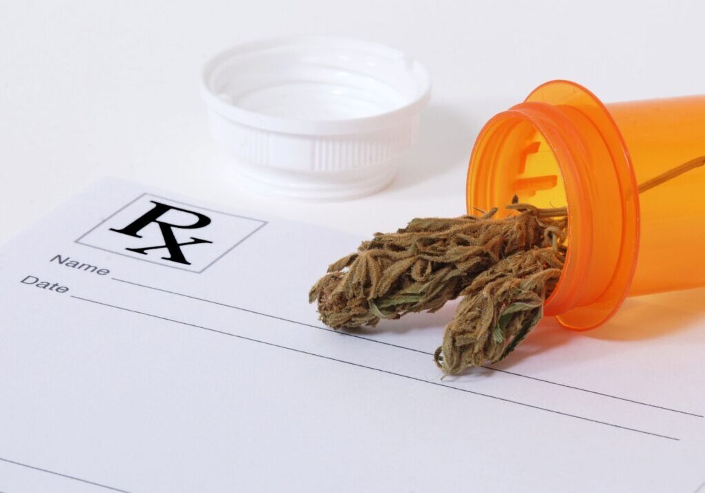 Prescription form with medical marijuana container.